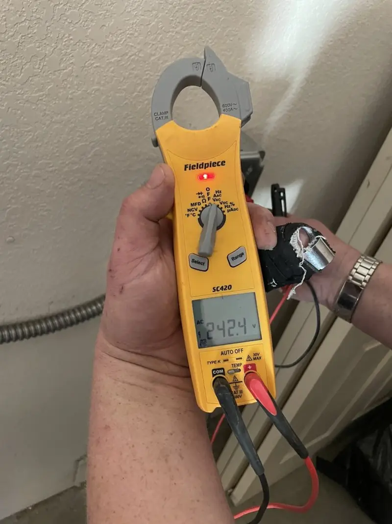 Voltage testing with clamp meter during Generator Installation in Banning